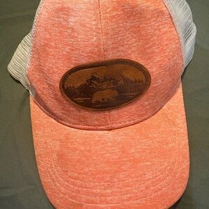 Orange Hat with Leather Tag (outdoor mountain scene with bear)